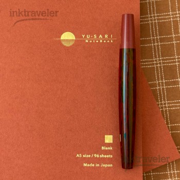 Eboya Kobue Tanshin True Heart fountain pen placed on a writing desk.