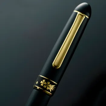 gold cherry blossom pattern on decorative ring