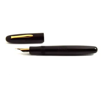 black polished ebonite body with uncapped pen