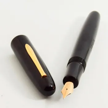 black polished ebonite body with uncapped pen
