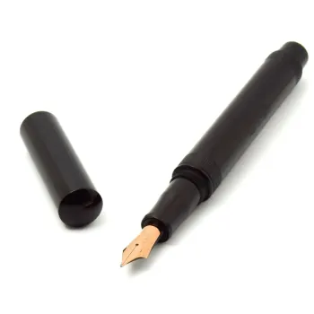 eboya kyouka kuroi black medium fountain pen without clip with cap placed beside
