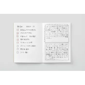 passport md paper dot grid refill open showing dotted pages with hand writing