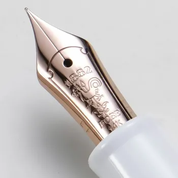 close up of the 14k gold nib with weathervane engraving