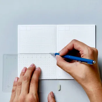pet plastic sheet with dots and ruler used as writing guide in hitotoki note