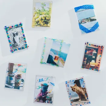 transparent hitotoki soda tape applied around small photos to create neat decorative frames