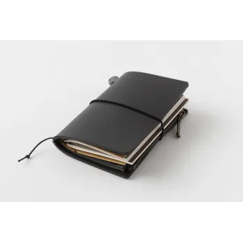 traveler's notebook card size black leather cover filled with refills