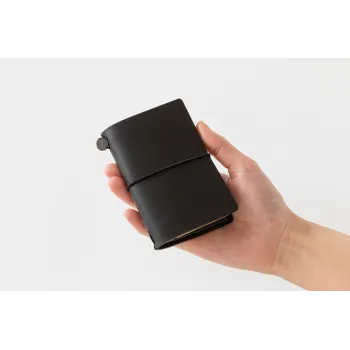 traveler's notebook card size black leather cover in hand