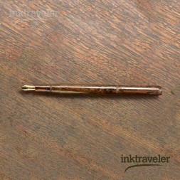 eboya yuzen nichibo sunset fountain pen open showing orange marbled ebonite body and gold nib